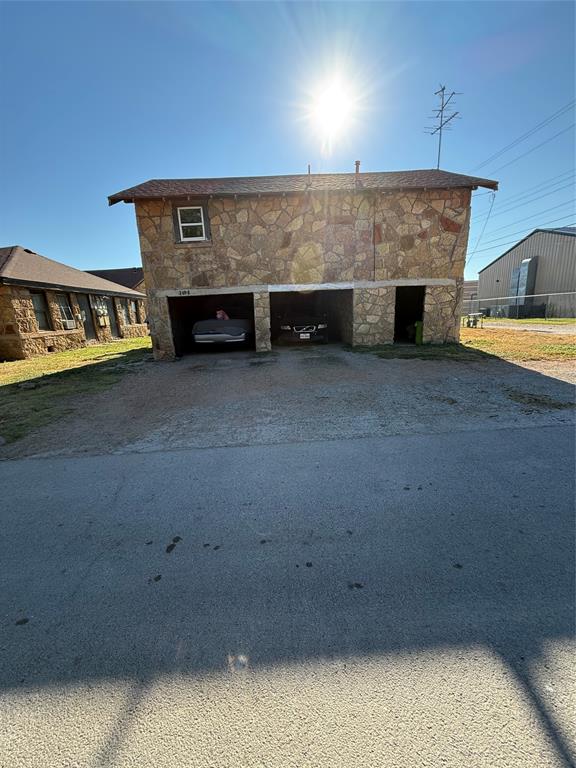 1849 South 14th Street Abilene, TX 79602 - Photo 5 of 8 an empty room with a fireplace