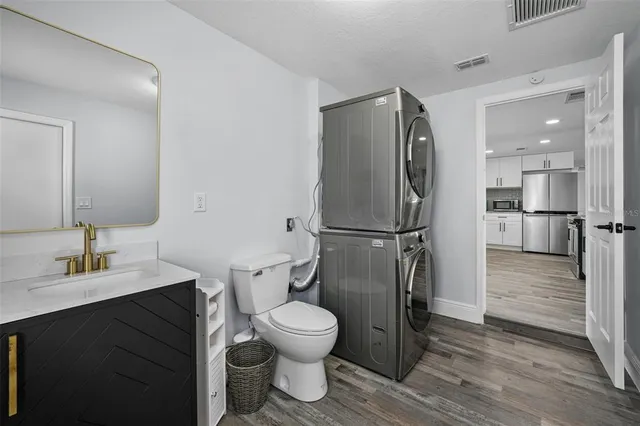 a view of a lake with houses with outdoor space