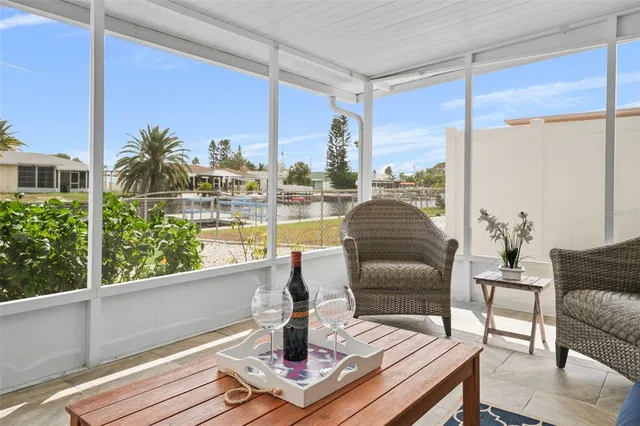 a living room with a couch and a table