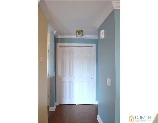 358 Rector Street, Unit 608 Perth Amboy, NJ 08861 - Photo 8 of 24 a view of a hallway with closet