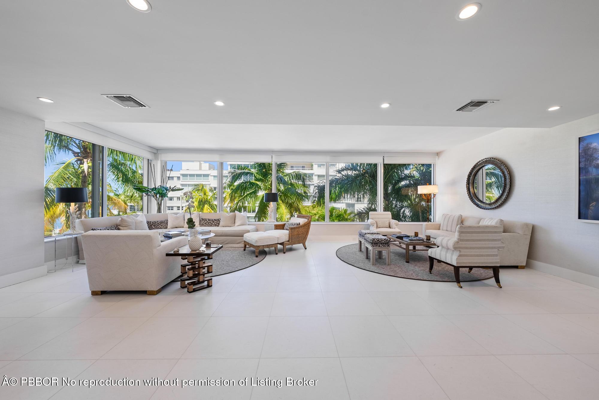 44 Cocoanut Row, Unit 310B Palm Beach, FL 33480 - Photo 1 of 30 a living room with furniture and a large window