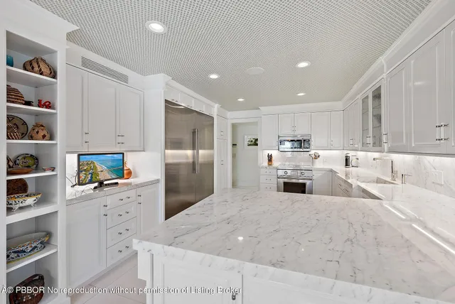 a large kitchen with cabinets
