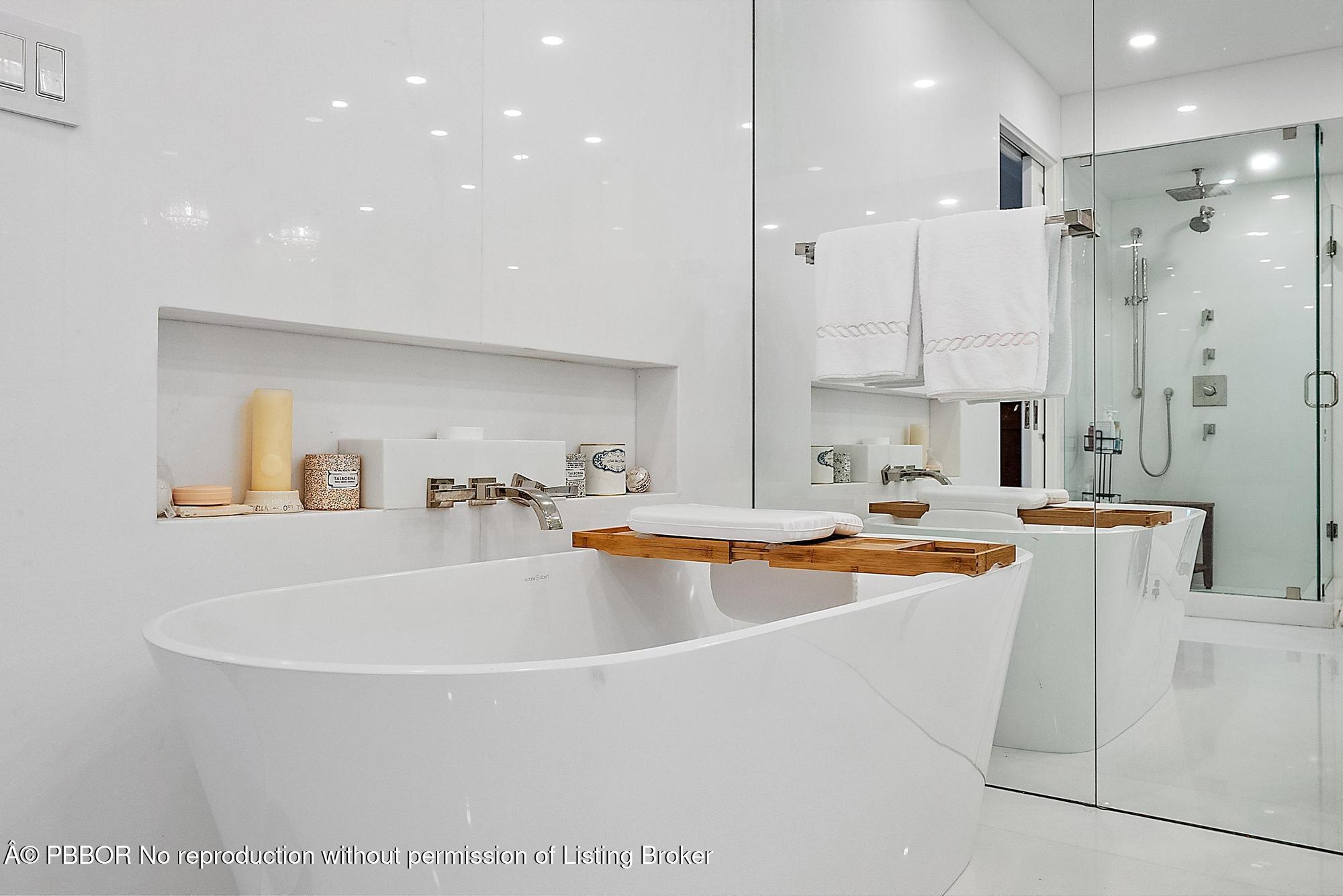 44 Cocoanut Row, Unit 310B Palm Beach, FL 33480 - Photo 19 of 30 a large white kitchen with a large window