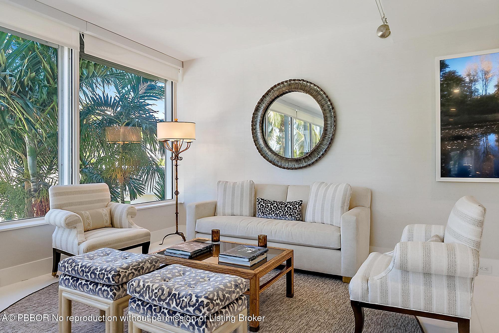 44 Cocoanut Row, Unit 310B Palm Beach, FL 33480 - Photo 5 of 30 a living room with furniture and a large window