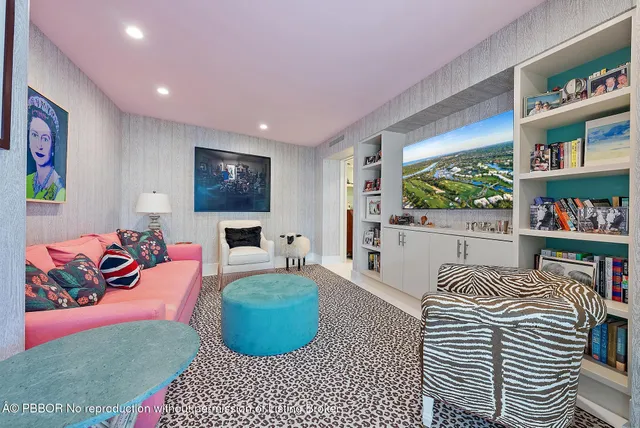 a bedroom with furniture and a wooden floor