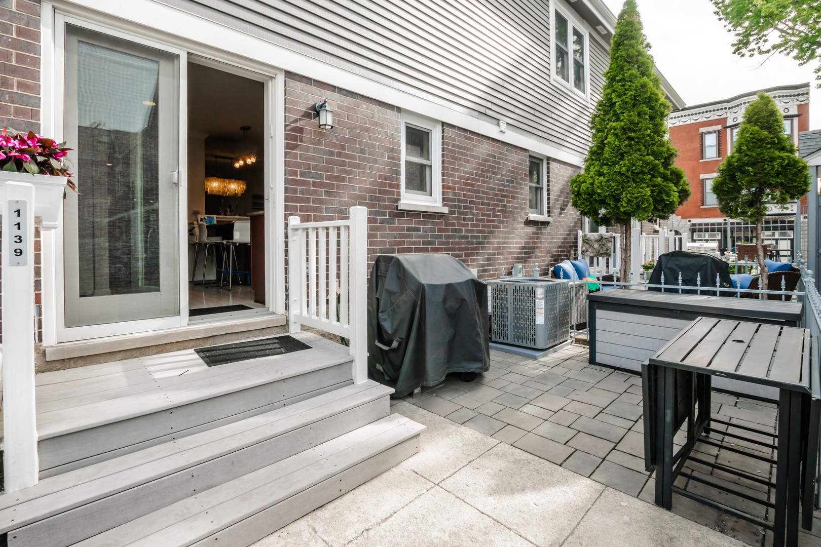 1139 West Roscoe Street Chicago, IL 60657 - Photo 20 of 28 a view of a entryway door front of house