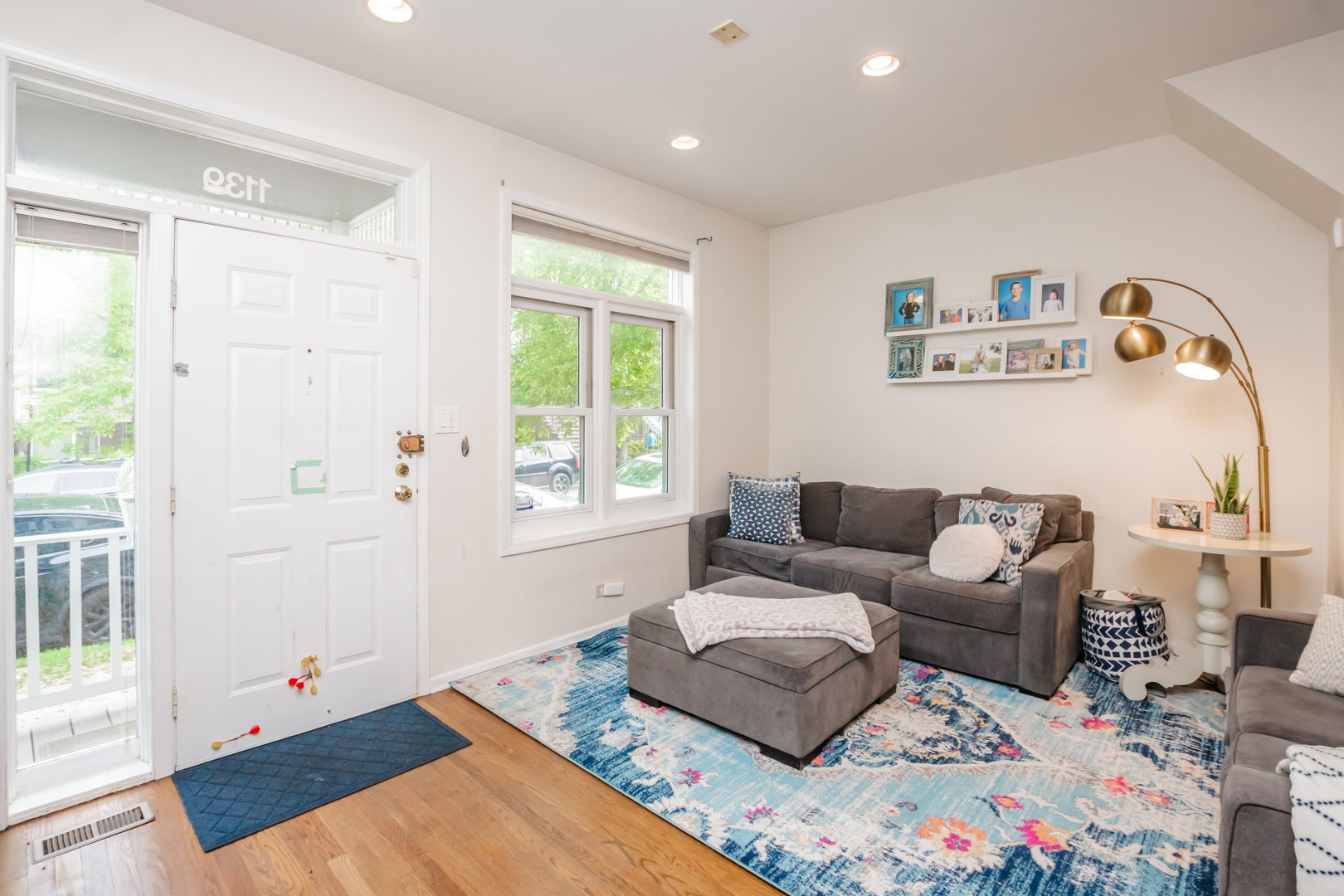 1139 West Roscoe Street Chicago, IL 60657 - Photo 4 of 28 a living room with furniture and a window