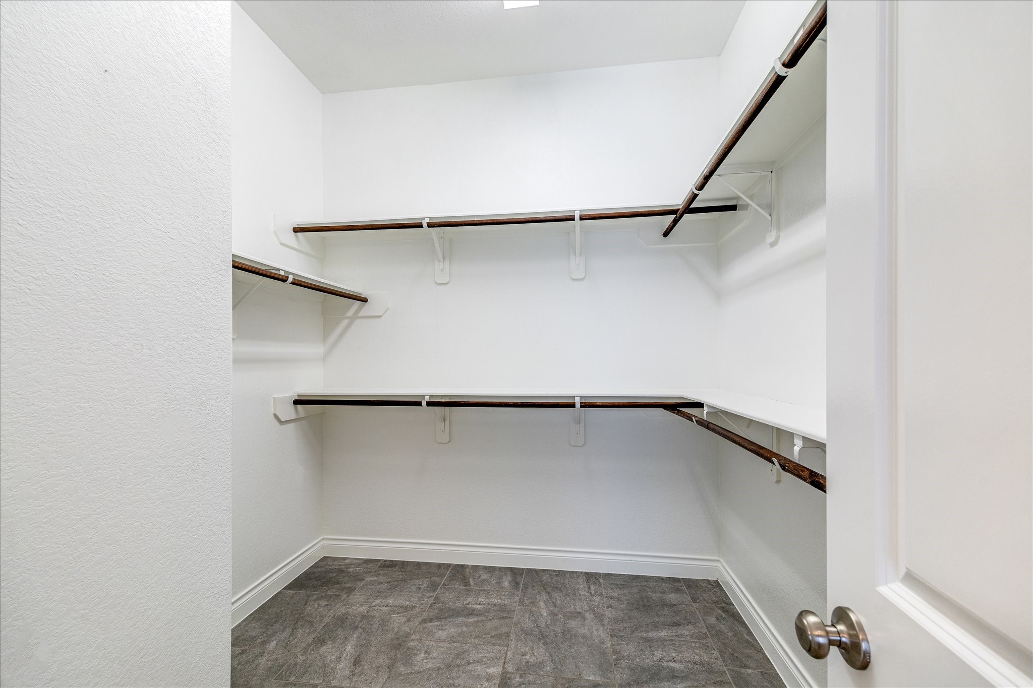 253 Trillium Park Loop Conroe, TX 77304 - Photo 24 of 37 a view of an empty walk in closet