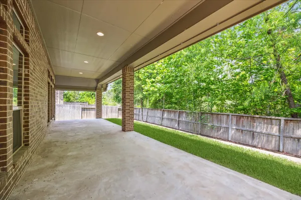 a view of backyard with green space
