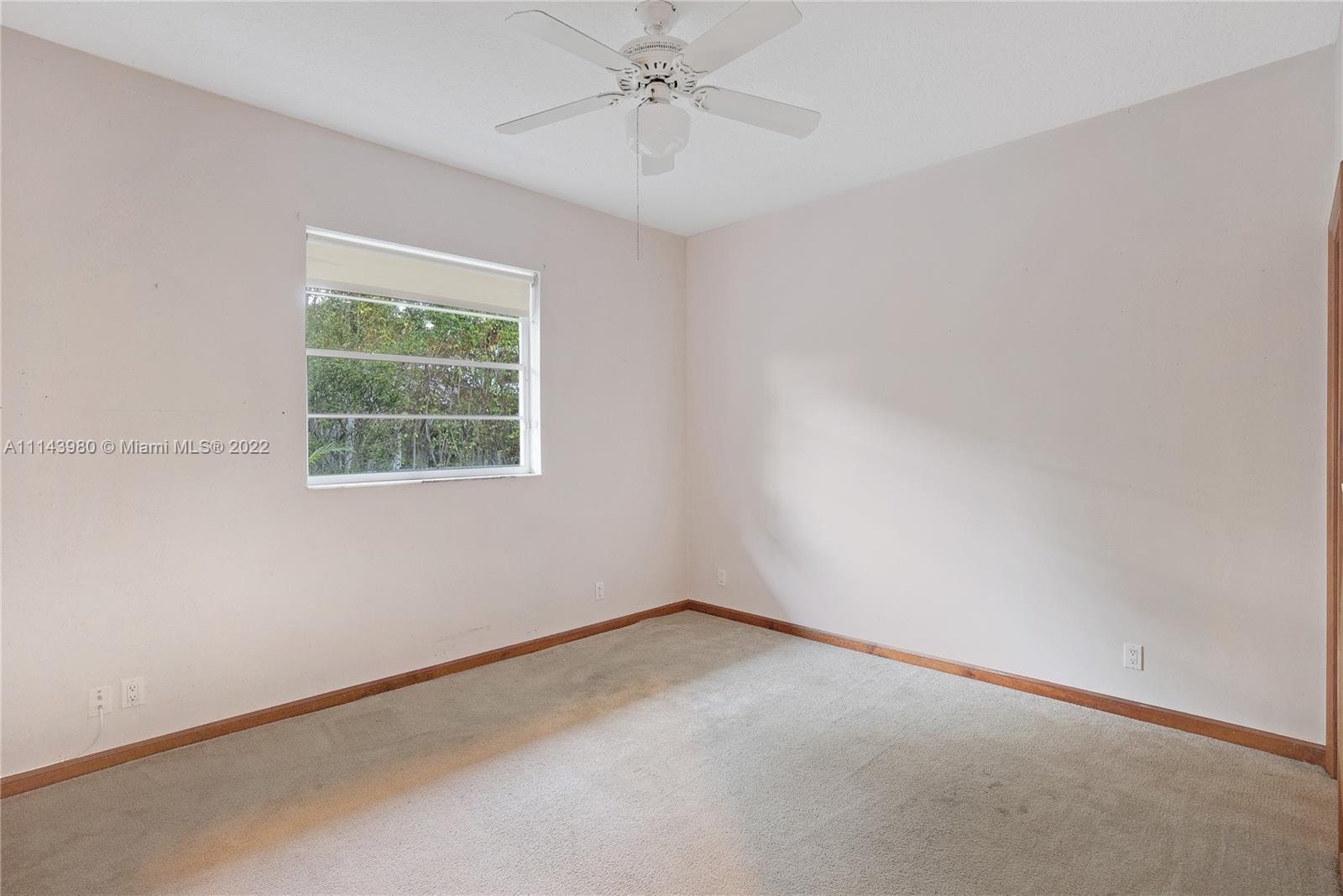 323 Cardinal Avenue Boca Raton, FL 33486 - Photo 28 of 56 an empty room with a window