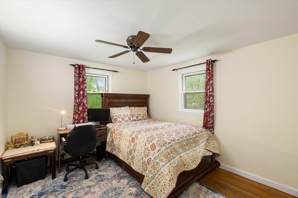 4 Hitchinpost Road Chelmsford, MA 01824 - Photo 16 of 25 a bedroom with a bed a desk and chair