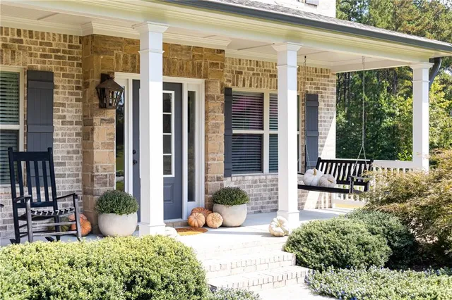 a view of a building with a window and garden