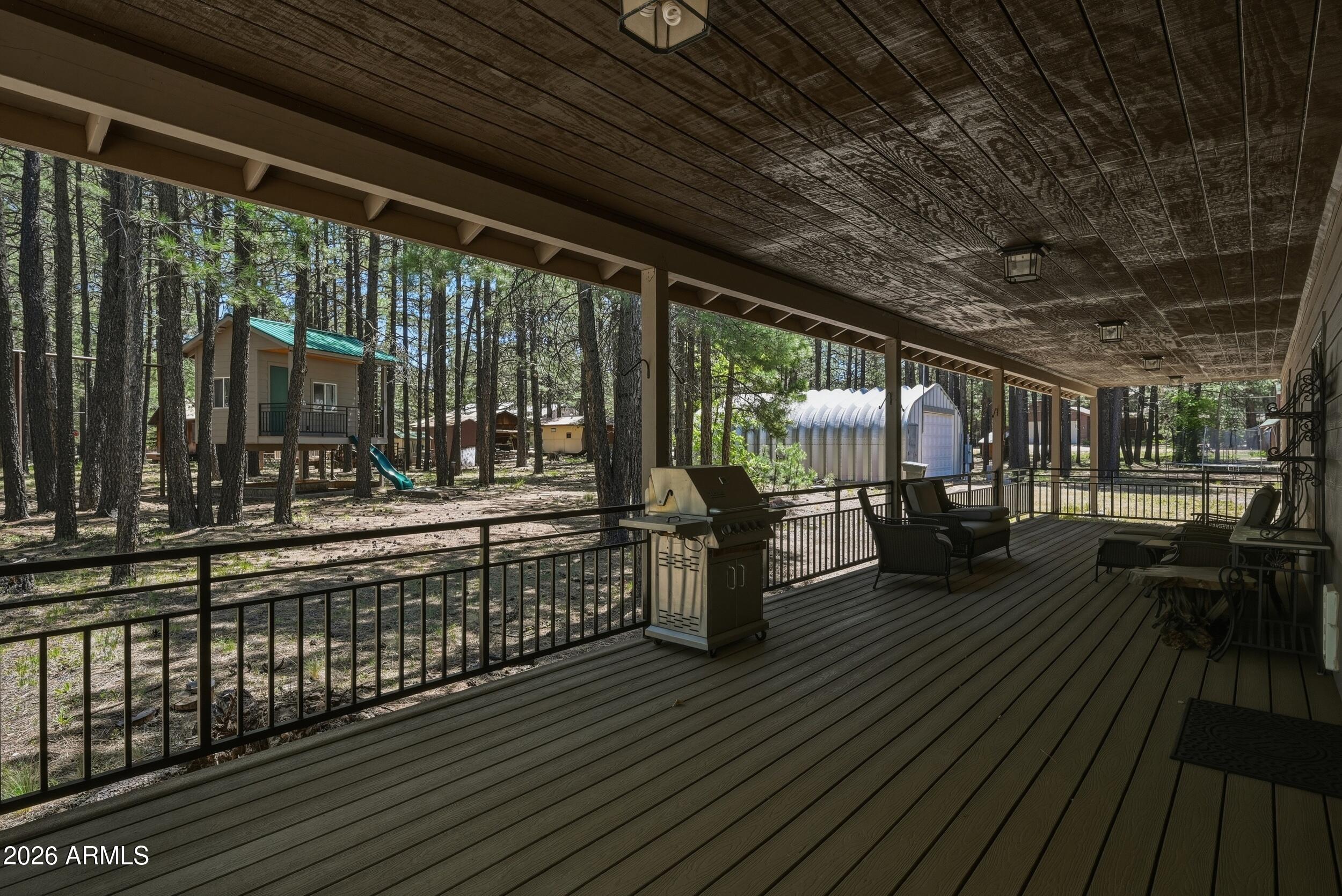 1233 Merzville Road Forest Lakes, AZ 85931 - Photo 30 of 42 Back Porch - Tree House