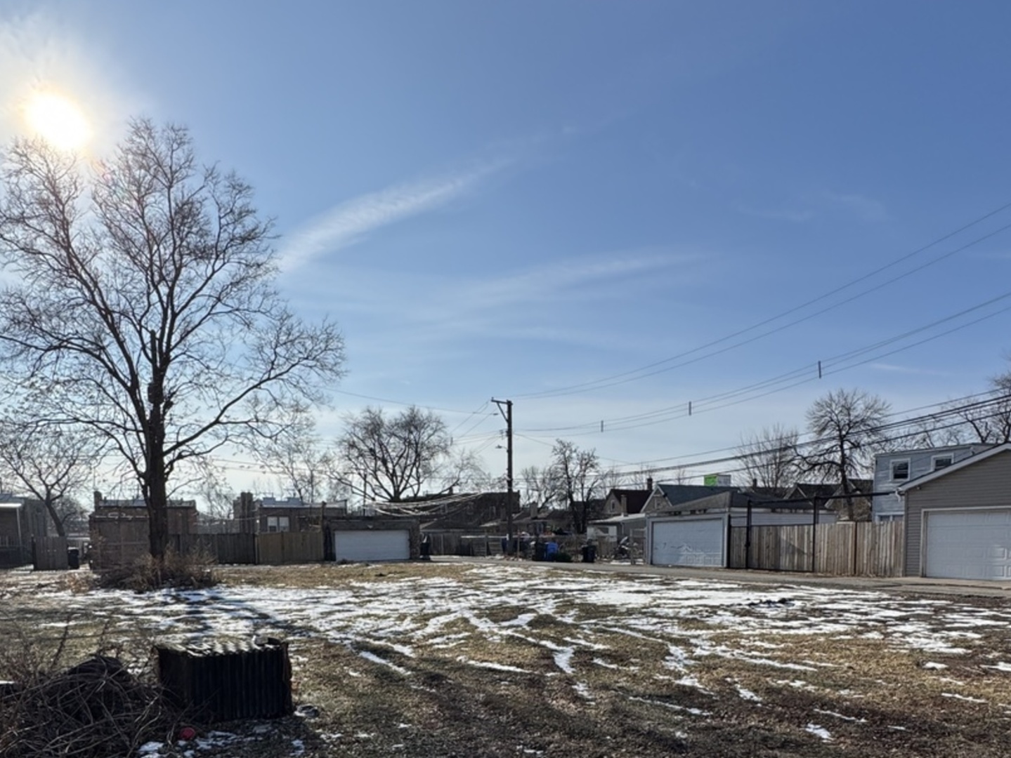 a view of a street with a tree