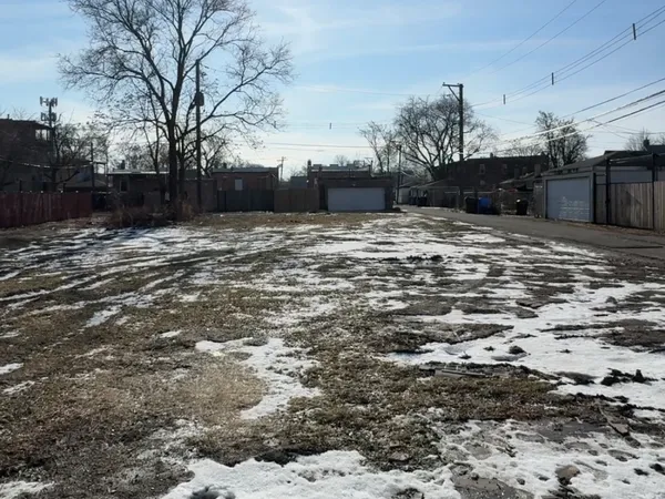 a street view with wooden fence