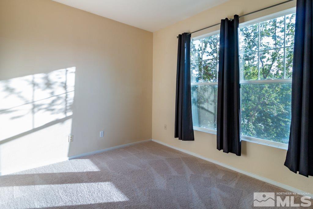 9630 Truckee Meadows Place Reno, NV 89521 - Photo 12 of 18 a view of an empty room with a window