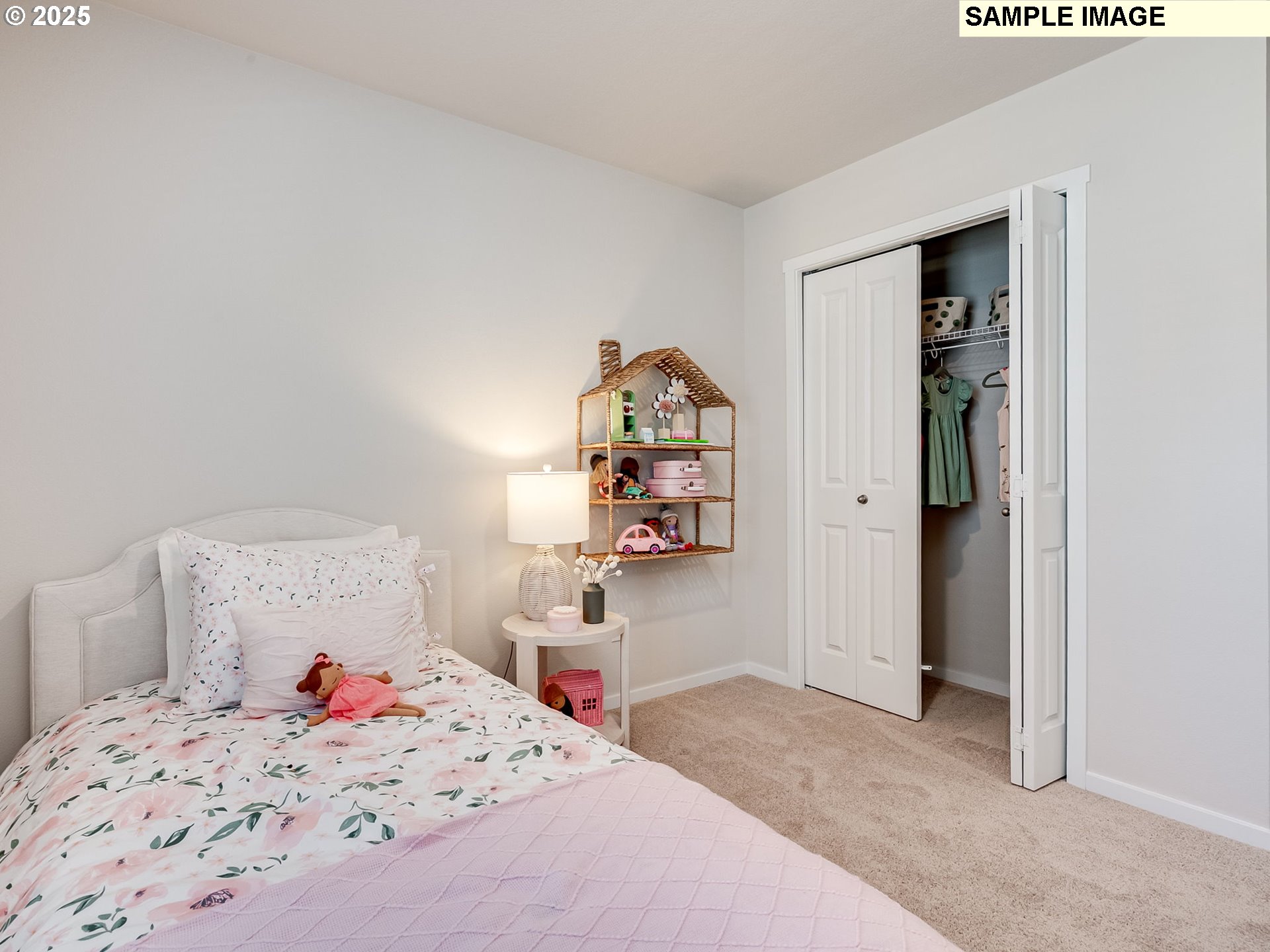 155 Northwest 30th Street Battle Ground, WA 98604 - Photo 23 of 36 a bedroom with a bed and cabinets