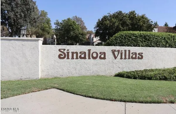 a view of a park with welcome board