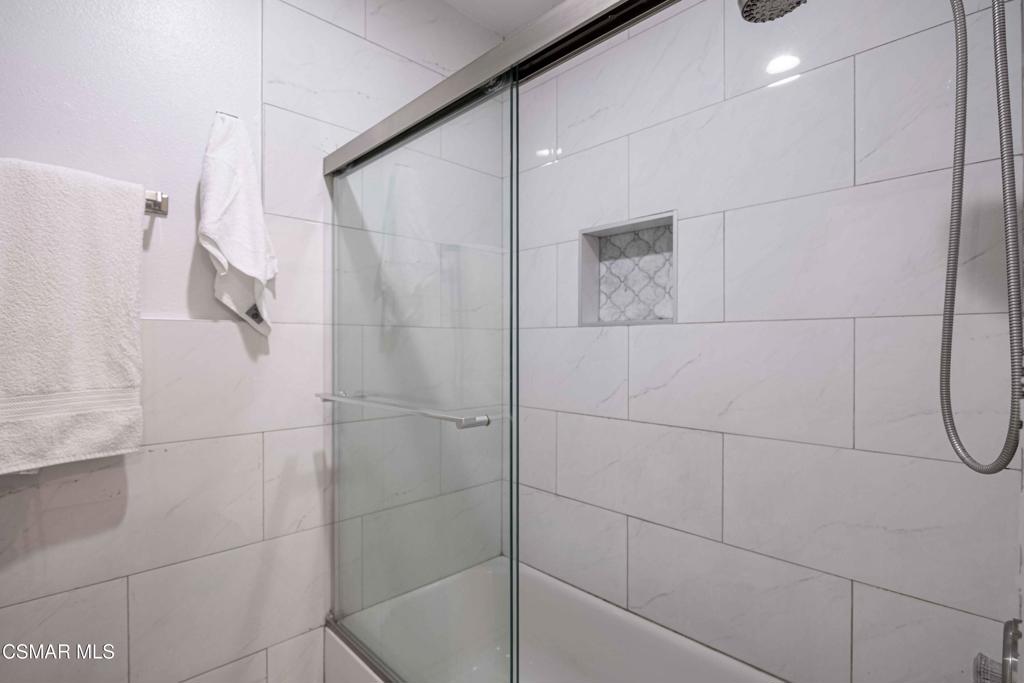 1718 Sinaloa Road, Unit 219 Simi Valley, CA 93065 - Photo 18 of 41 a bathroom with a shower