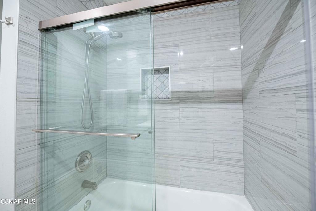 1718 Sinaloa Road, Unit 219 Simi Valley, CA 93065 - Photo 23 of 41 a bathroom with a shower