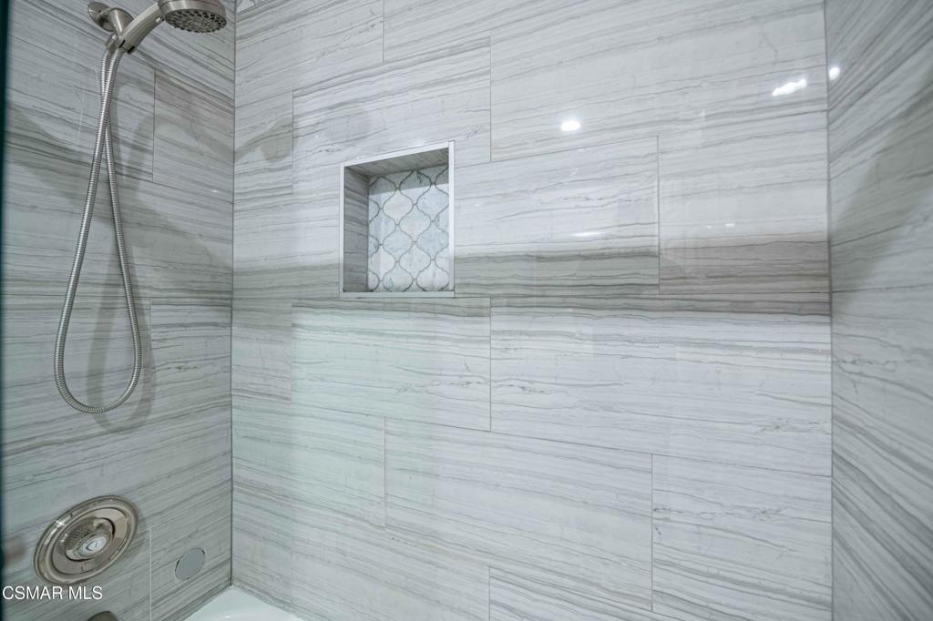 1718 Sinaloa Road, Unit 219 Simi Valley, CA 93065 - Photo 24 of 41 a bathroom with a shower