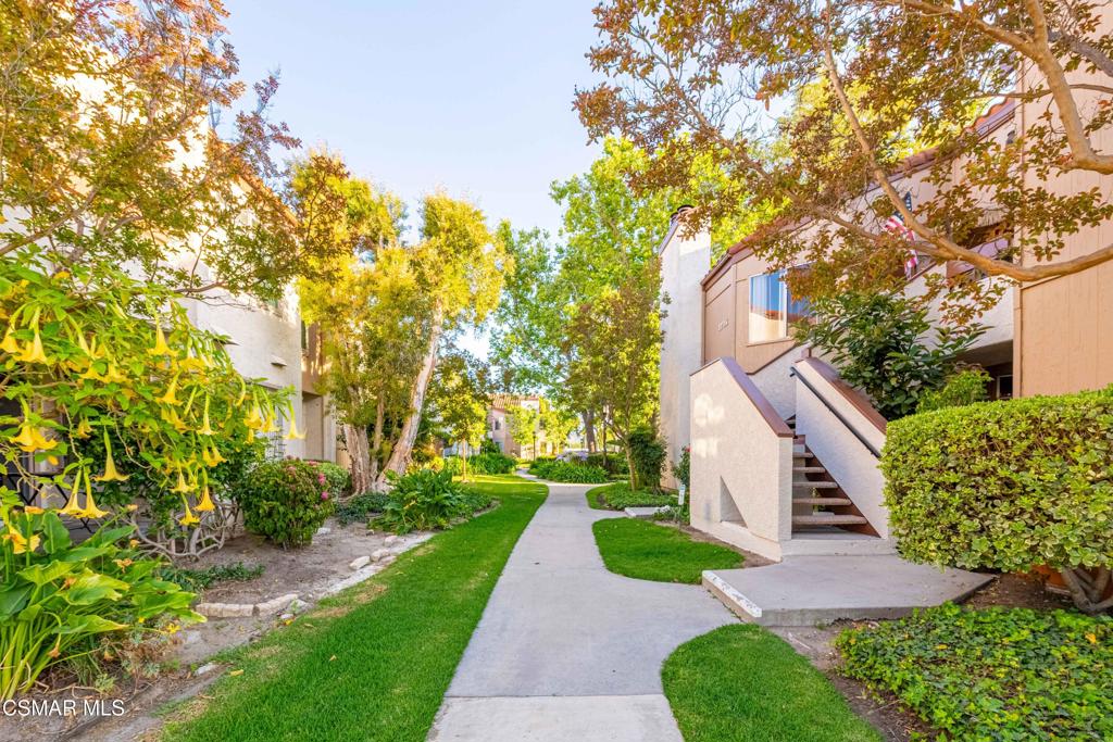 1718 Sinaloa Road, Unit 219 Simi Valley, CA 93065 - Photo 29 of 41 a view of pathway with yard