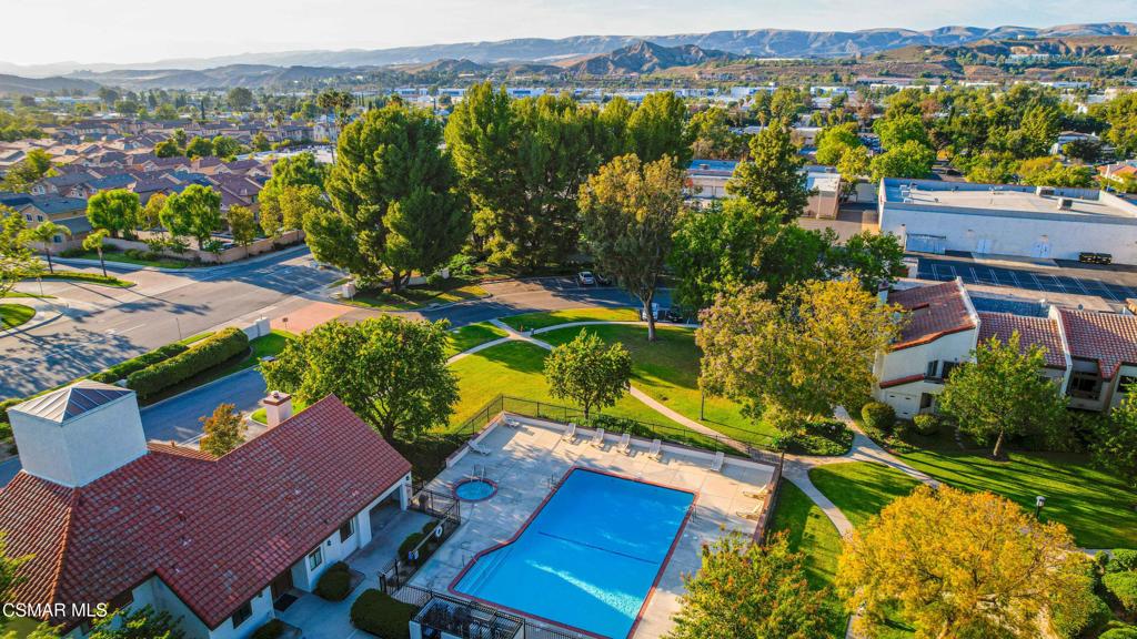 1718 Sinaloa Road, Unit 219 Simi Valley, CA 93065 - Photo 34 of 41 an aerial view of a house with a yard and lake view