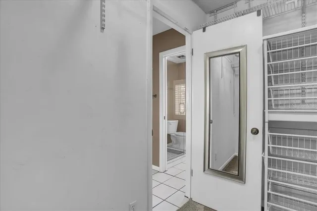 an aerial view of a house with swimming pool