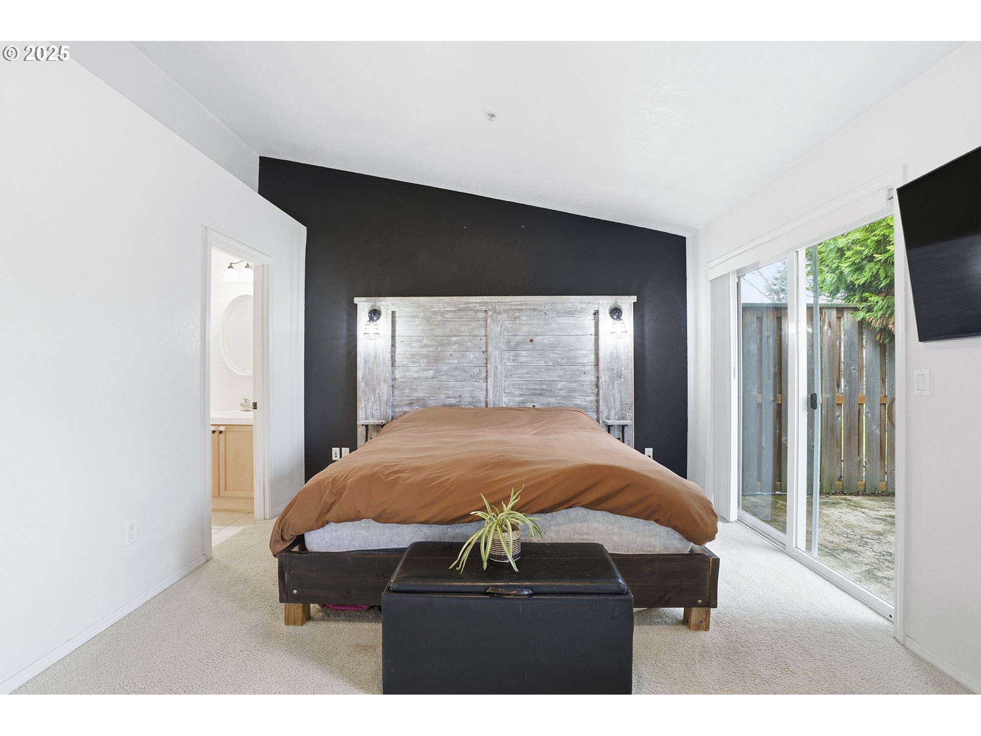 445 Harris Lane Oregon City, OR 97045 - Photo 17 of 29 a bed room with a bed and a television