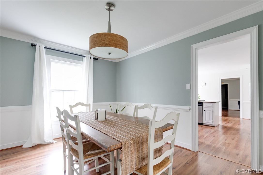 2910 East Brigstock Road Midlothian, VA 23113 - Photo 25 of 45 a view of a dining room with furniture and wooden floor