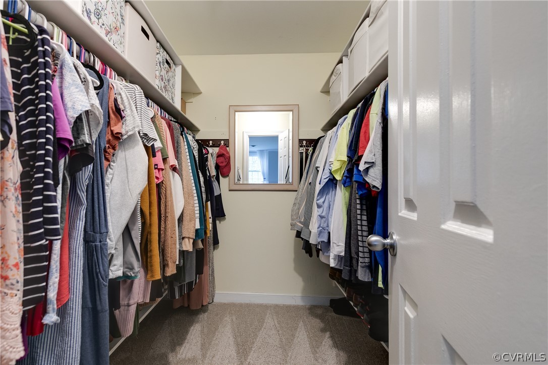 2910 East Brigstock Road Midlothian, VA 23113 - Photo 40 of 45 a view of walk in closet with clothes and shoes