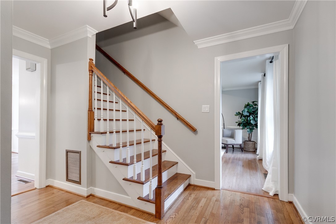 2910 East Brigstock Road Midlothian, VA 23113 - Photo 7 of 45 a view of entryway and hall with wooden floor