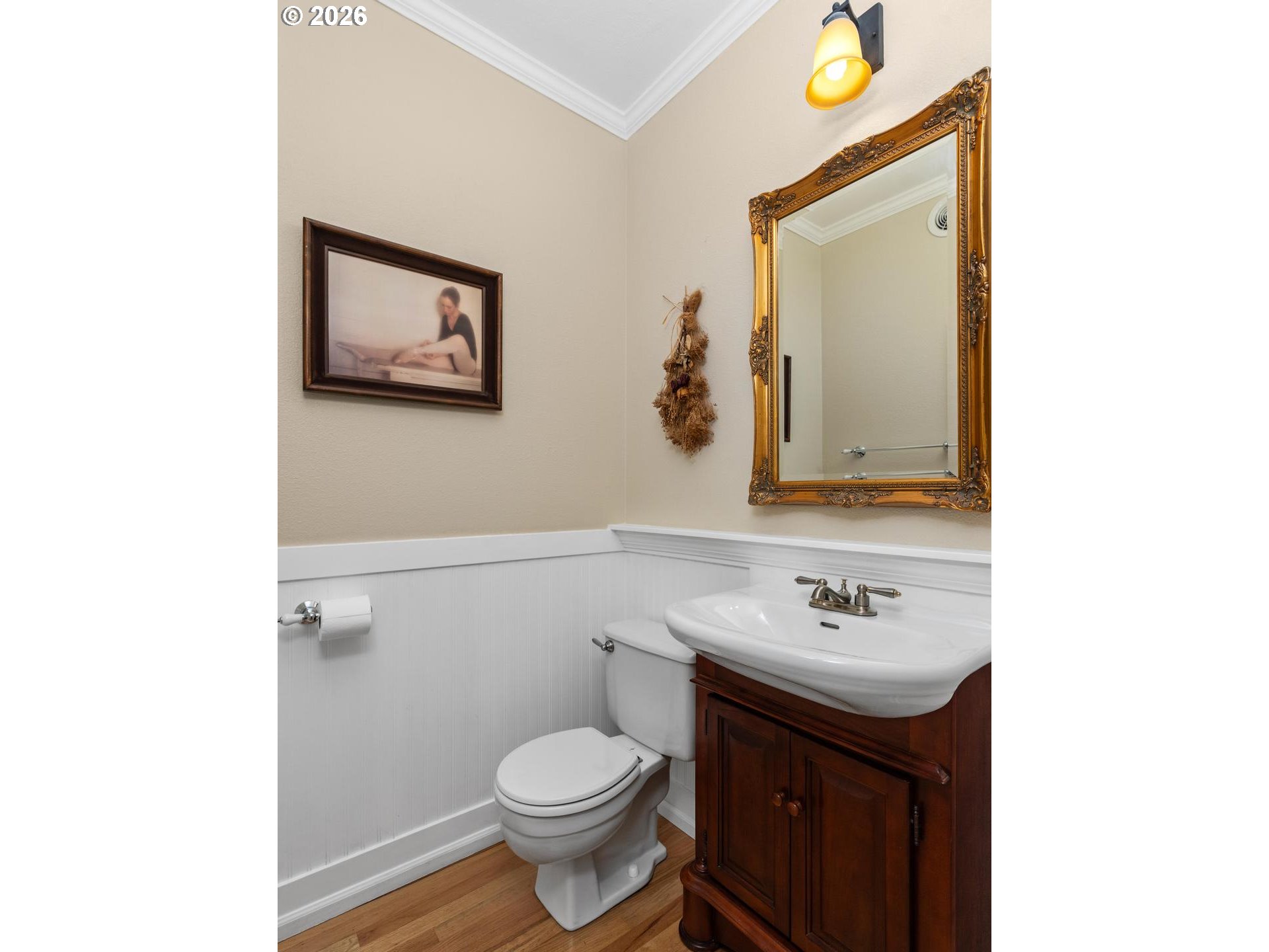 16042 Southwest Waxwing Way Beaverton, OR 97007 - Photo 20 of 48 a bathroom with a toilet sink and mirror