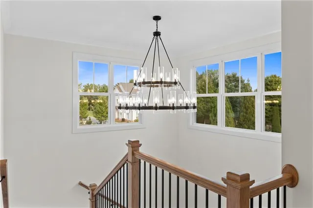a view of a hallway with windows