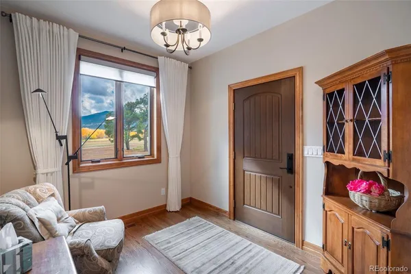 a view of a livingroom with furniture and window