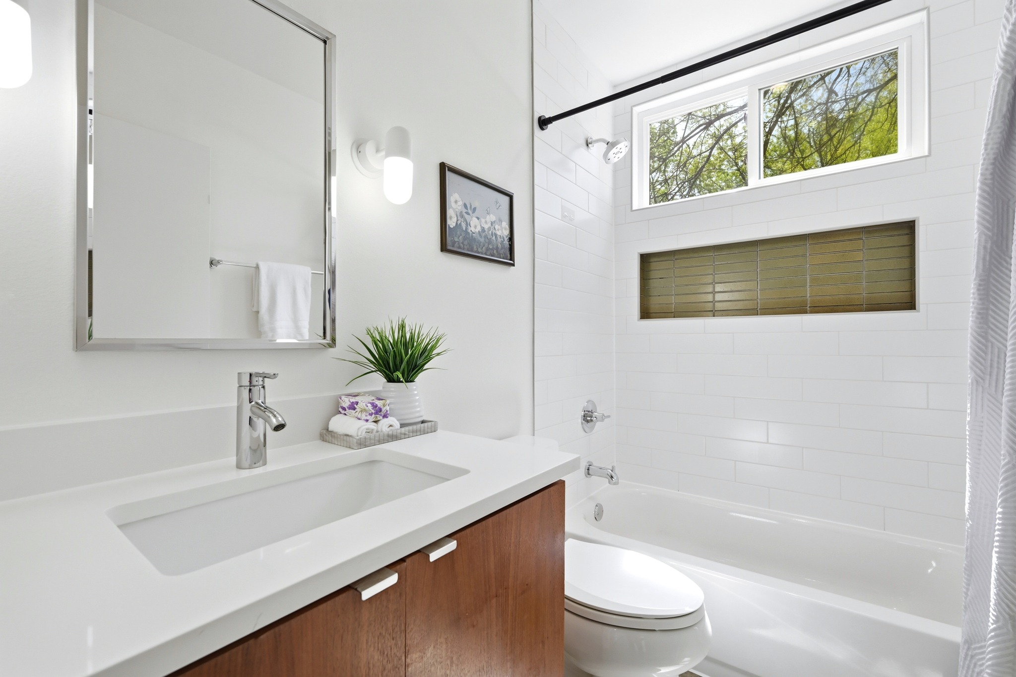 1805 Tillery Street Austin, TX 78721 - Photo 16 of 23 Bathroom featuring vanity and shower / bath combo with shower curtain