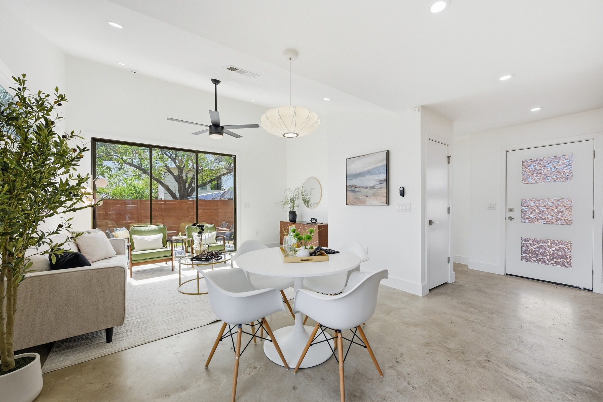 1805 Tillery Street Austin, TX 78721 - Photo 8 of 23 Dining room with concrete flooring, recessed lighting, and ceiling fan