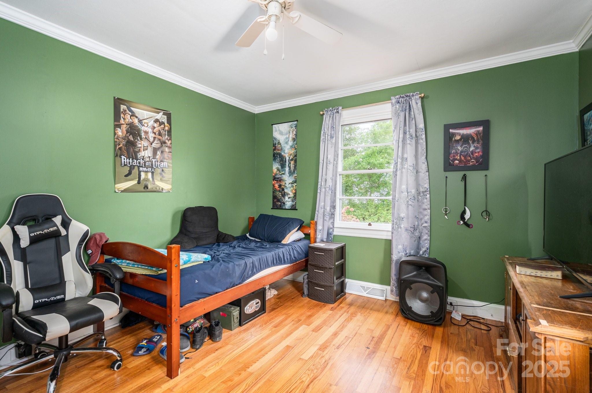 400 North Houser Street Cherryville, NC 28021 - Photo 17 of 26 a bed room with furniture and a window