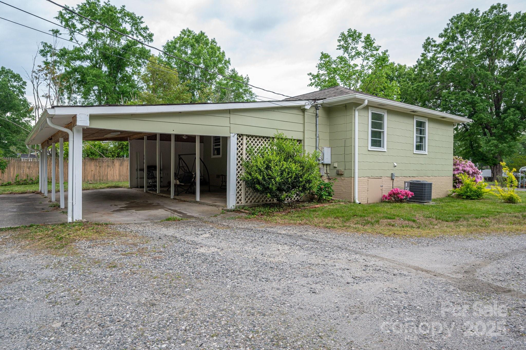 400 North Houser Street Cherryville, NC 28021 - Photo 2 of 26 a view of a house with backyard