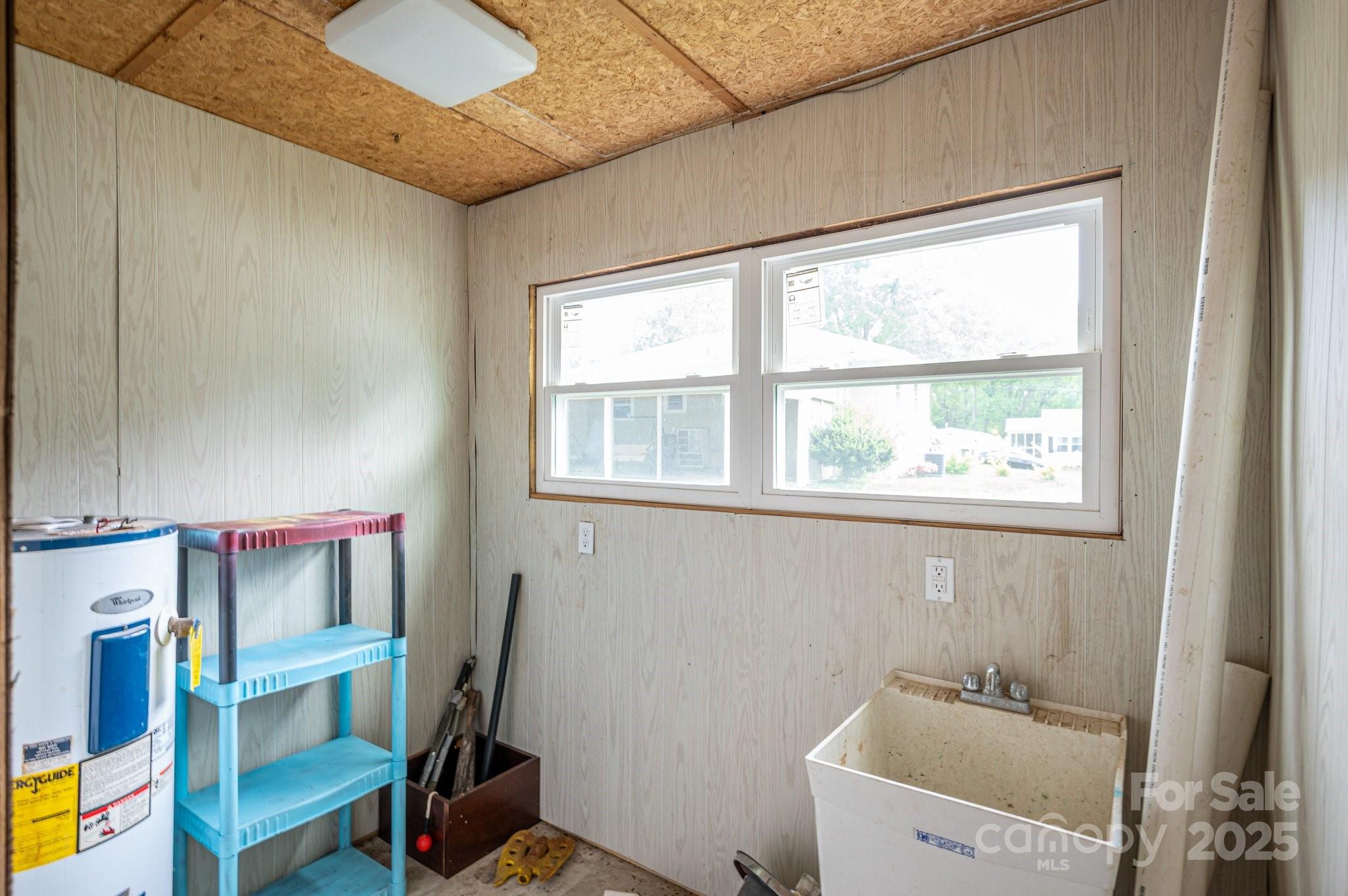 400 North Houser Street Cherryville, NC 28021 - Photo 26 of 26 a bathroom with a sink and a window