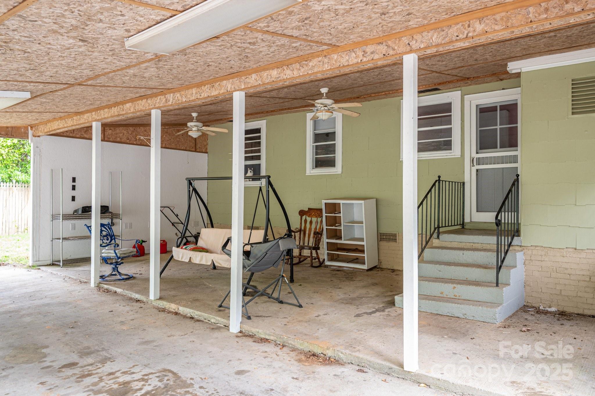 400 North Houser Street Cherryville, NC 28021 - Photo 3 of 26 a view of an outdoor space with porch