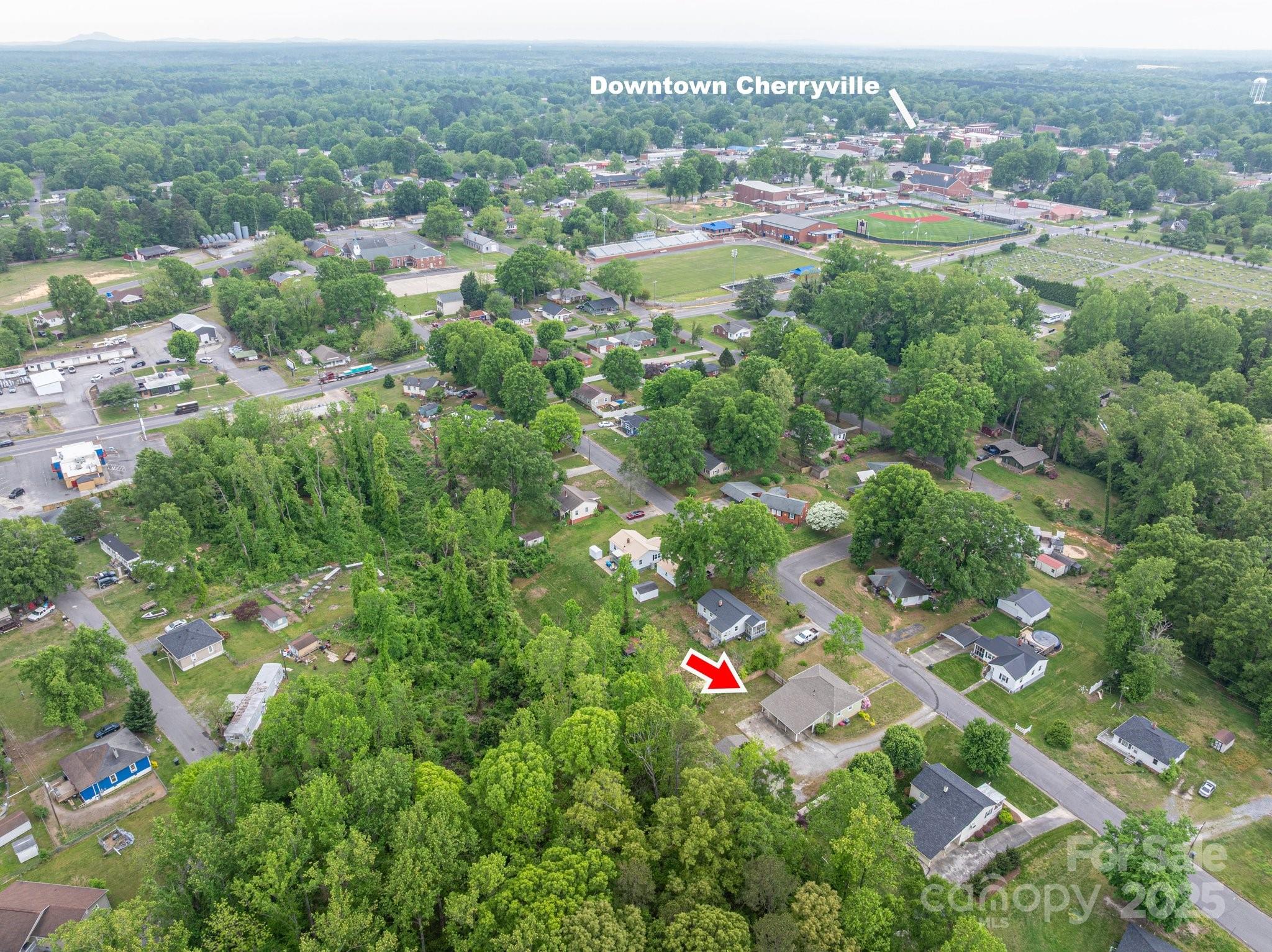 400 North Houser Street Cherryville, NC 28021 - Photo 6 of 26 an aerial view of residential houses with outdoor space and trees