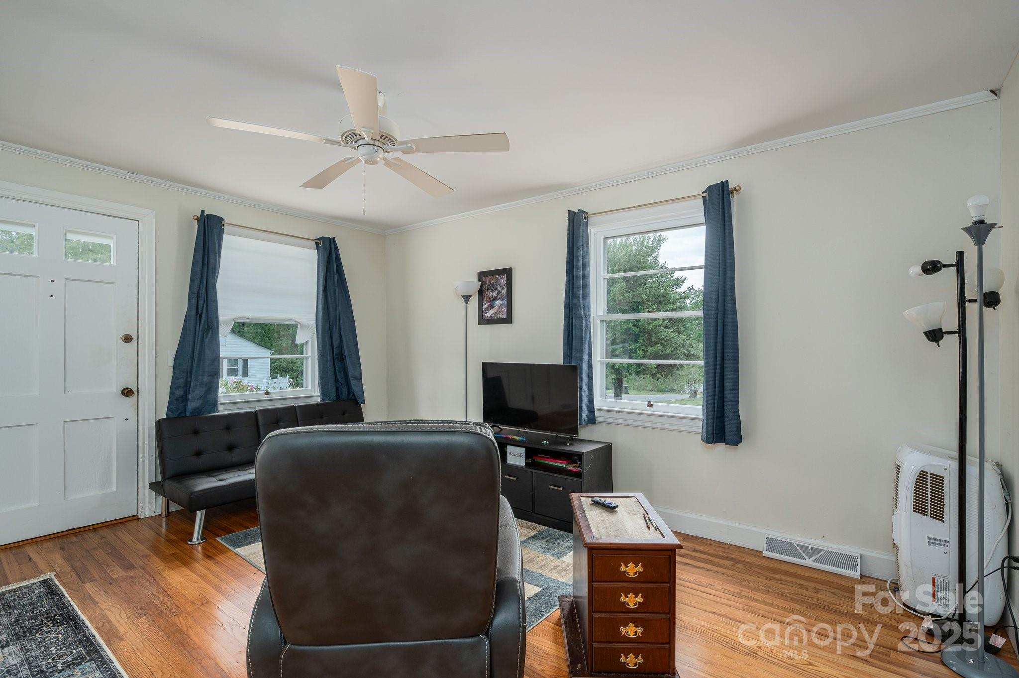 400 North Houser Street Cherryville, NC 28021 - Photo 8 of 26 a view of a livingroom with workspace and a window