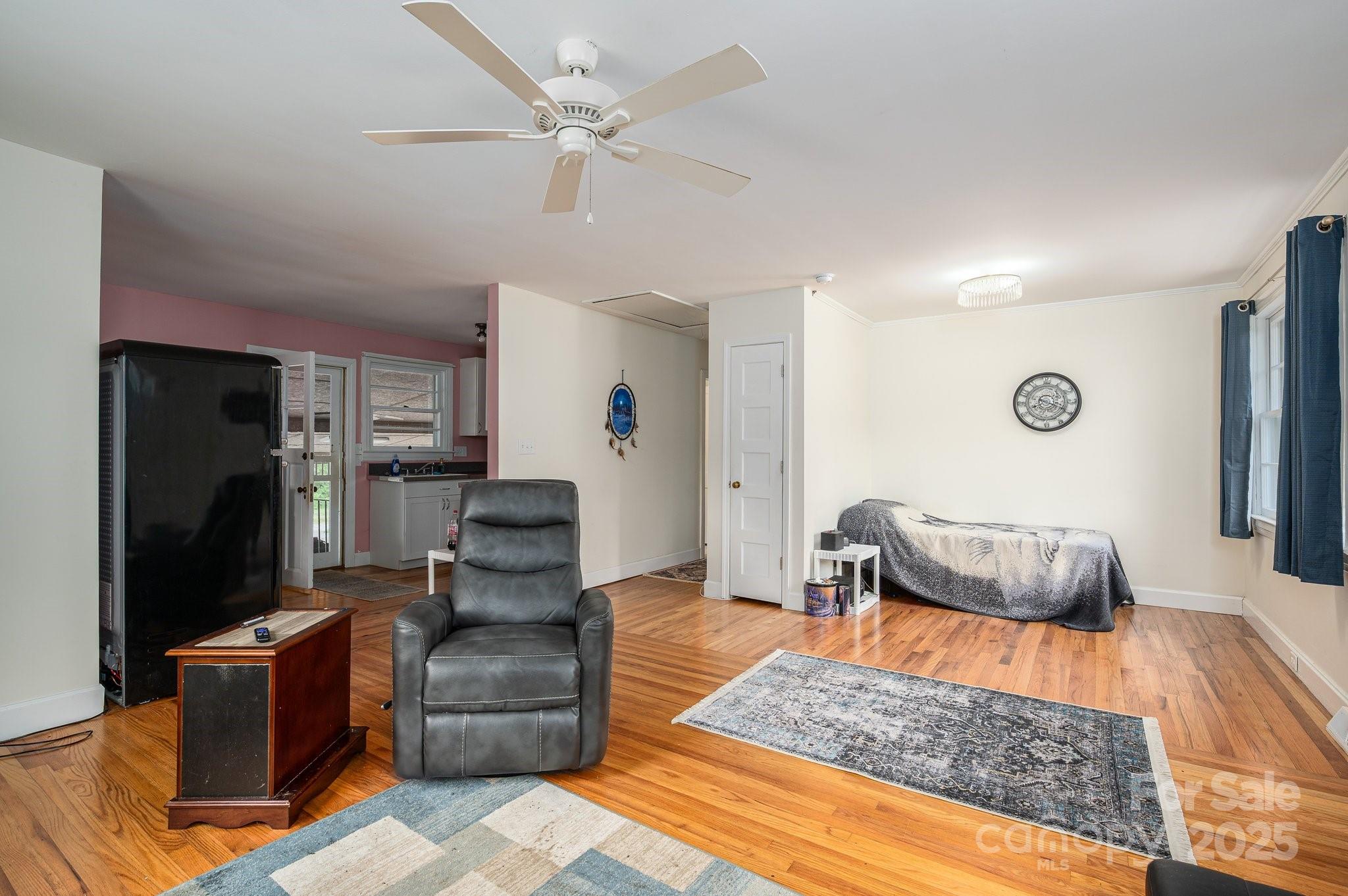 400 North Houser Street Cherryville, NC 28021 - Photo 9 of 26 a living room with furniture and a flat screen tv