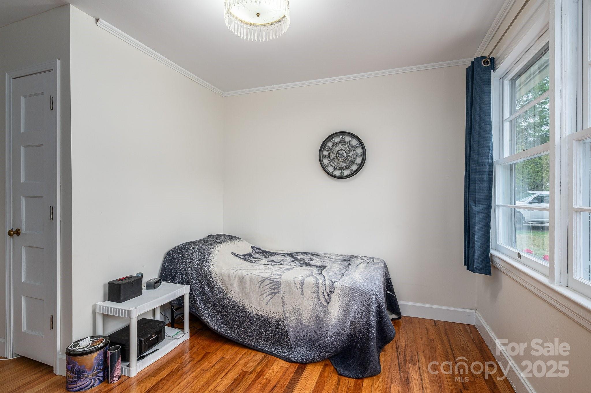 400 North Houser Street Cherryville, NC 28021 - Photo 10 of 26 a bedroom with furniture and a window
