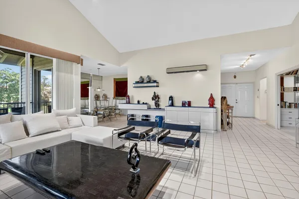 a kitchen with stainless steel appliances a sink stove and cabinets