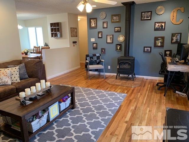 687 Ibis Lane Reno, NV 89503 - Photo 6 of 14 a living room with furniture and wooden floor