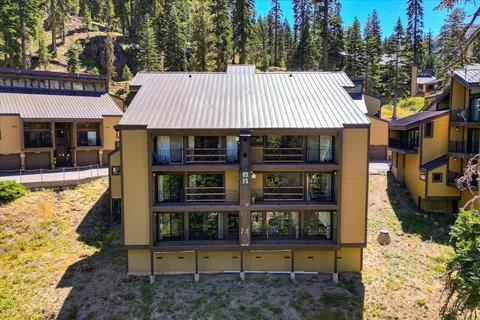 a view of a house with roof deck