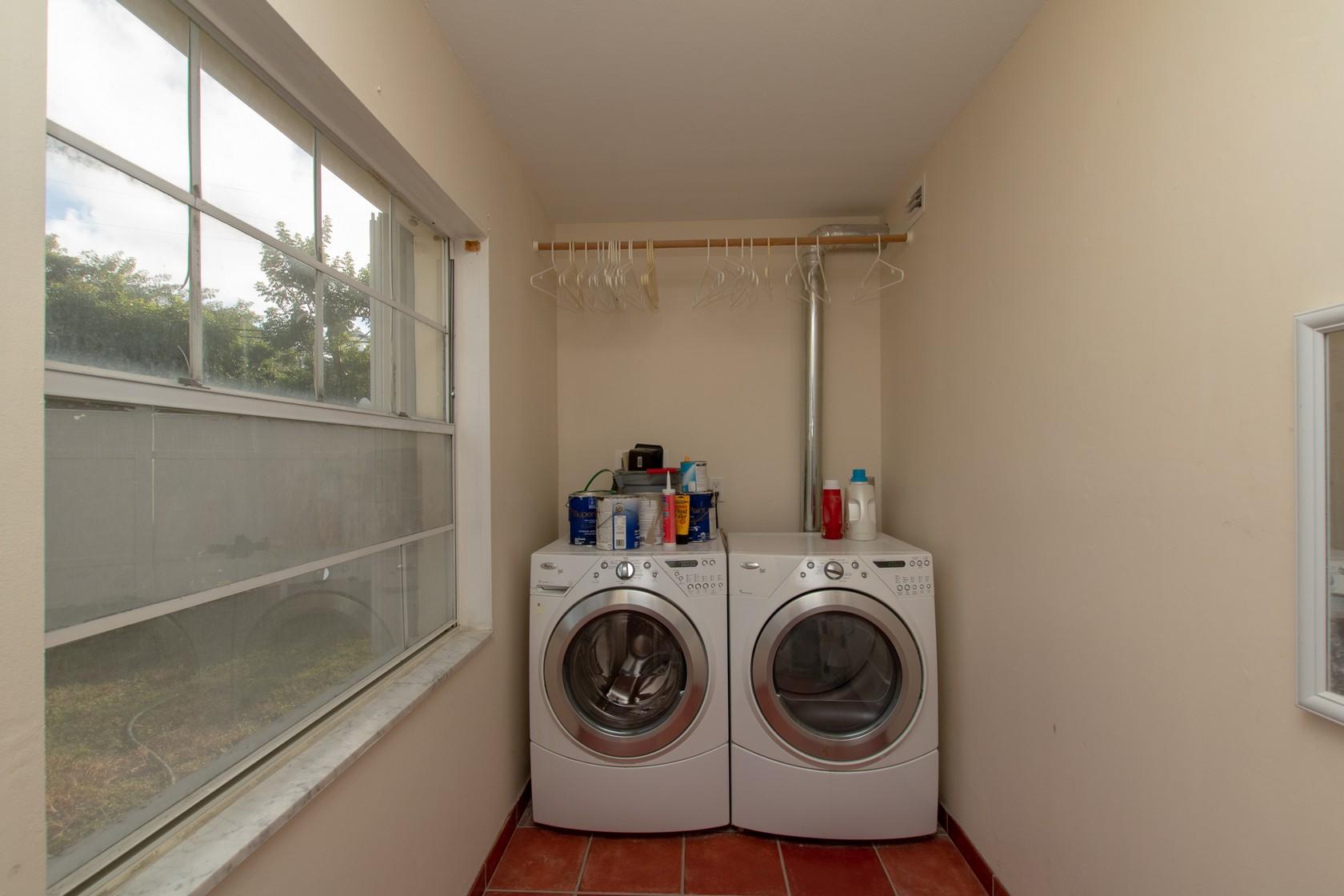 40 High Point Road, Unit A106 Tavernier, FL 33070 - Photo 23 of 35 Walk-in Closet with Washer and Dryer