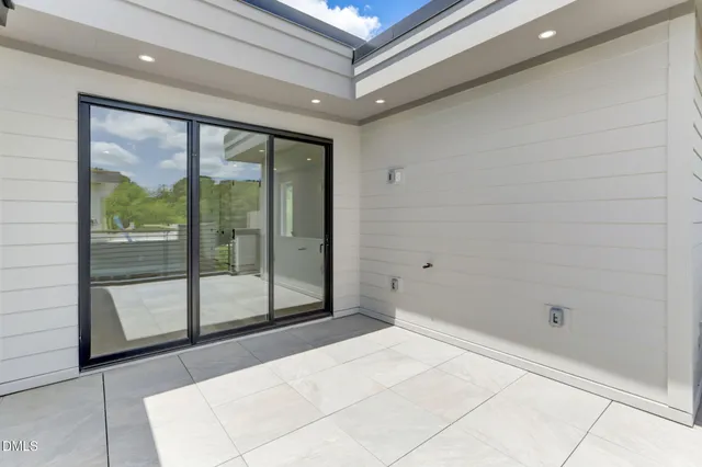 a front view of a house with a porch